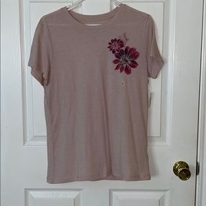 pink shirt w dark pink flowers.